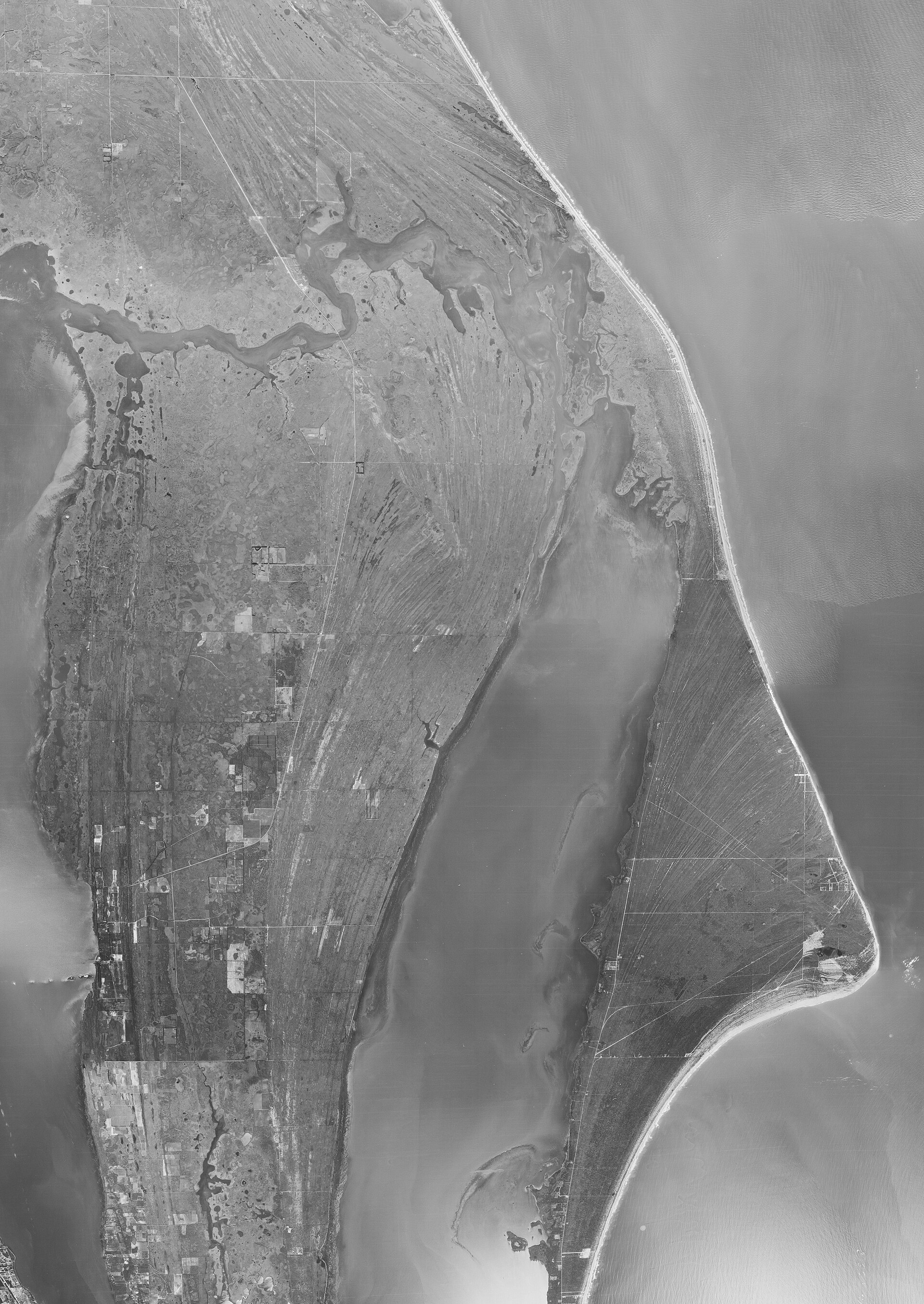 Aerial photograph of Cape Canaveral on December 19, 1950, showing the largely undeveloped cape as the federal government was clearing the village for the proving ground.